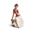 Statuina Fiore di Vita NAO in porcellana donna con fiore 28 cm
