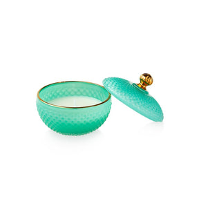 Candela profumata Emò Italia in vetro verde con decoro a rombi 9x8,5 cm