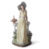 Statuetta Dama Lladrò in porcellana lucida dai toni pastello 35x17 cm