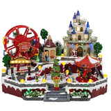 TIMSTOR Paesaggio di Natale Ruota Panoramica Carosello con Movimento Musica e LED 51x39,5cm