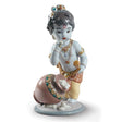 Statuetta Krishna Butterthief Lladrò in porcellana decorata 21x10 cm