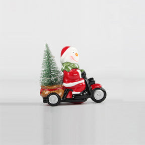 Pupazzo di neve su moto Timstor in ceramica decorazione natalizia 12x6x11 cm